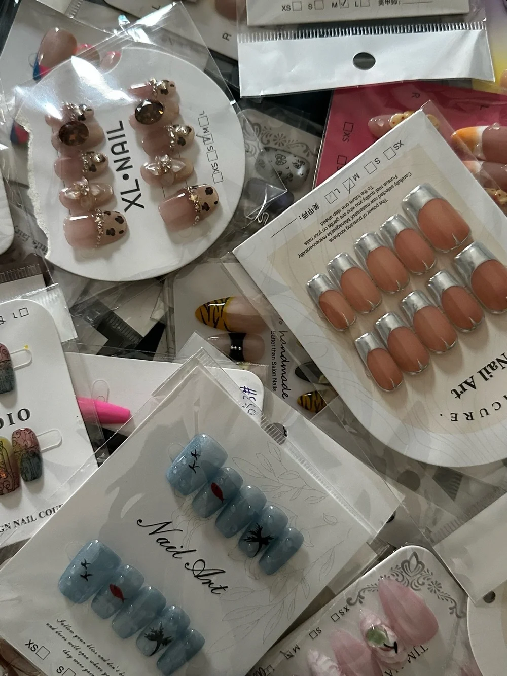 100 Sets of SURPRISE Assorted Press-On Nail Sets - Floral, Pink, Blue, Neutral